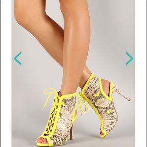 Yellow snake skin shoes